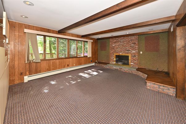 Empty room, Fireplace, Interior, Recessed Lighting, Stone Walls, Wooden Beams, Wooden Walls