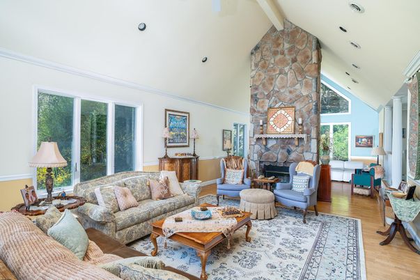 Fireplace, Interior, Living room, Recessed Lighting, Stone Walls, Wood Texture Flooring