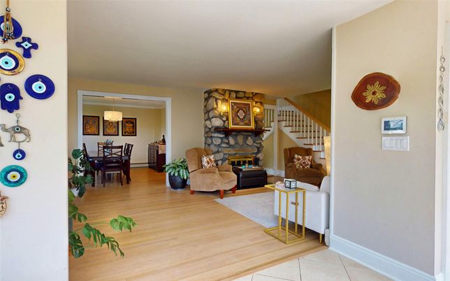Dining room, Fireplace, Interior, Living room, Pendant Lights, Stone Walls, Wood Texture Flooring