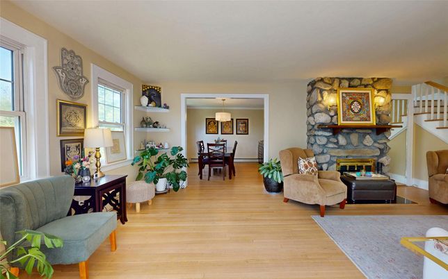 Dining room, Fireplace, Interior, Pendant Lights, Stone Walls, Wood Texture Flooring