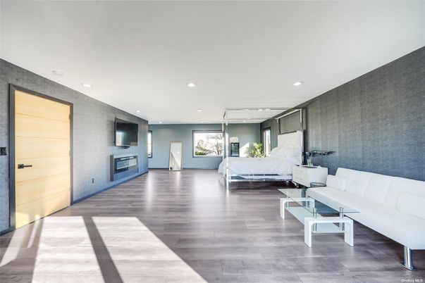 Bedroom, Fireplace, Interior, Living room, Recessed Lighting, Wood Texture Flooring