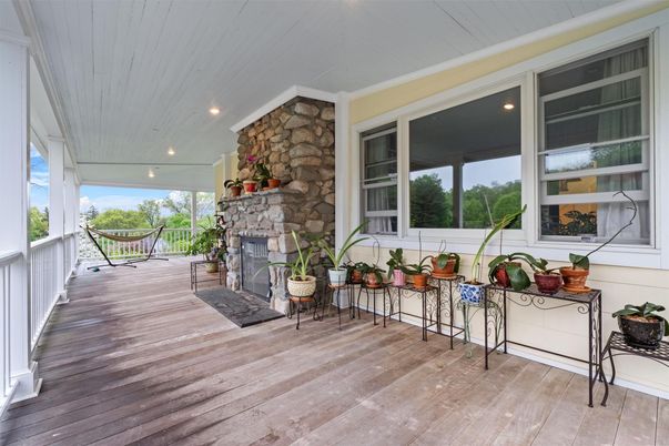 Exterior, Fireplace, Wood Texture Flooring