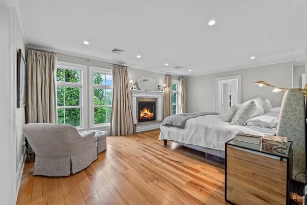 Bedroom, Fireplace, Interior, Recessed Lighting, Wood Texture Flooring