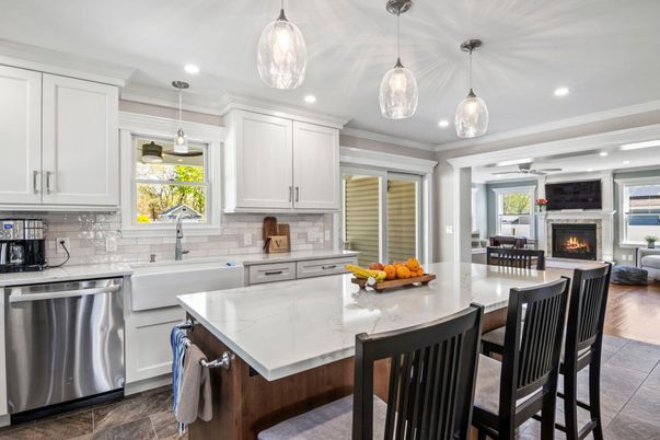 Dining room, Fireplace, Interior, Kitchen, Pendant Lights, Recessed Lighting, Stainless Steel Appliances, Wood Texture Flooring
