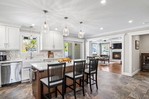 Dining room, Fireplace, Interior, Kitchen, Pendant Lights, Recessed Lighting, Stainless Steel Appliances, Wood Texture Flooring