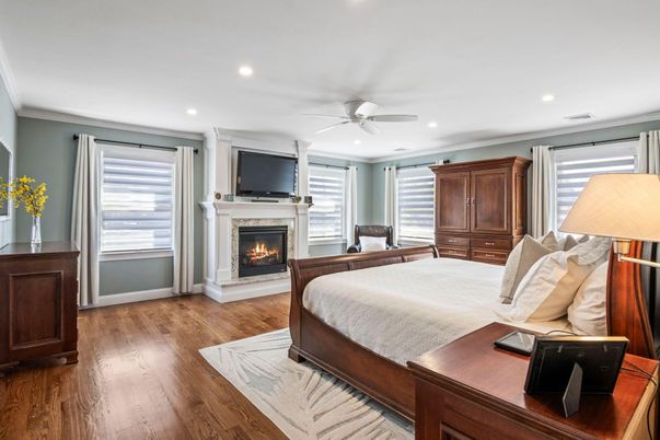 Bedroom, Fireplace, Interior, Recessed Lighting, Wood Texture Flooring
