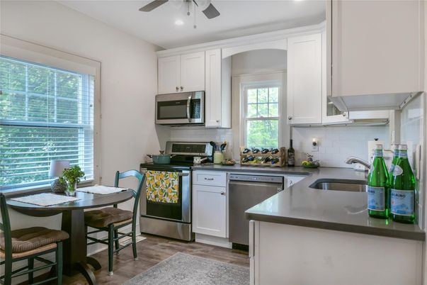 Dining room, Interior, Kitchen, Recessed Lighting, Stainless Steel Appliances, Wood Texture Flooring