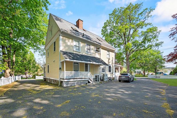 Exterior, Facade, Solar Panels, American Foursquare