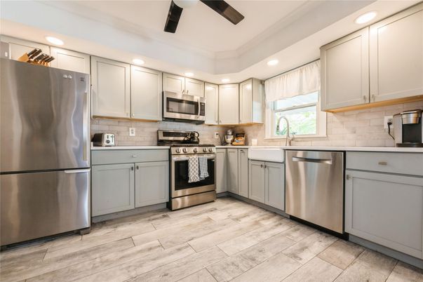 Interior, Kitchen, Recessed Lighting, Stainless Steel Appliances, Wood Texture Flooring