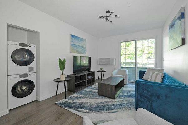 Interior, Living room, Utility Closets, Washer, Wood Texture Flooring