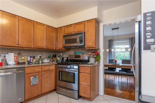 Dining room, Interior, Kitchen, Pendant Lights, Stainless Steel Appliances, Wood Texture Flooring