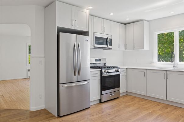 Interior, Kitchen, Recessed Lighting, Stainless Steel Appliances, Wood Texture Flooring