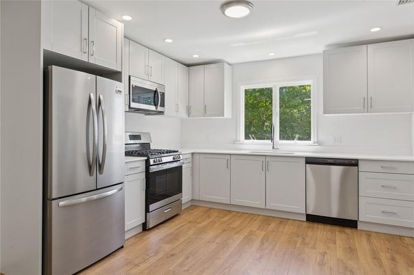 Interior, Kitchen, Recessed Lighting, Stainless Steel Appliances, Wood Texture Flooring