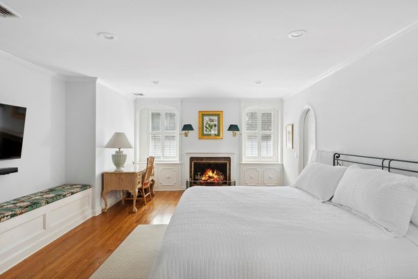 Bedroom, Fireplace, Interior, Recessed Lighting, Wood Texture Flooring