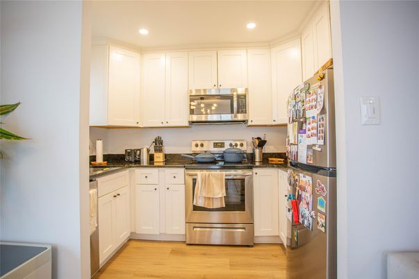 Interior, Kitchen, Recessed Lighting, Stainless Steel Appliances, Wood Texture Flooring