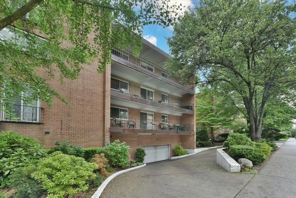 Attached, Exterior, Facade, Brick Facade, Condo Building