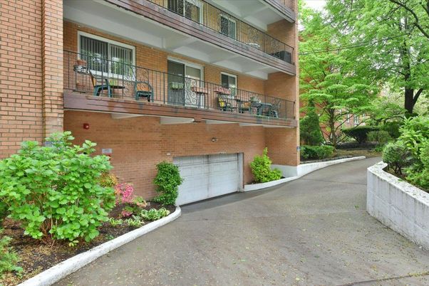 Attached, Exterior, Facade, Brick Facade, None