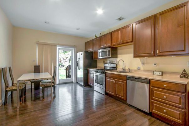 Dining room, Interior, Kitchen, Recessed Lighting, Stainless Steel Appliances, Wood Texture Flooring
