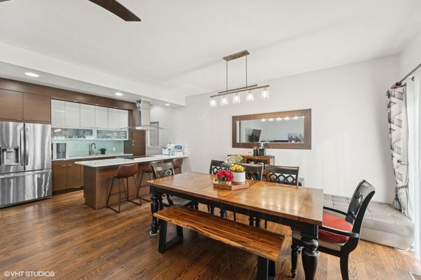 Dining room, Interior, Kitchen, Pendant Lights, Recessed Lighting, Stainless Steel Appliances, Wood Texture Flooring