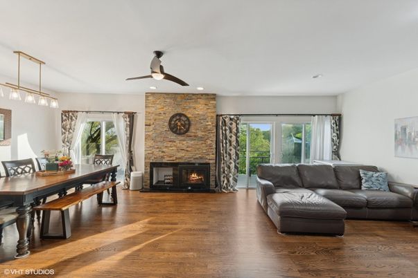 Dining room, Fireplace, Interior, Living room, Pendant Lights, Recessed Lighting, Stone Walls, Wood Texture Flooring