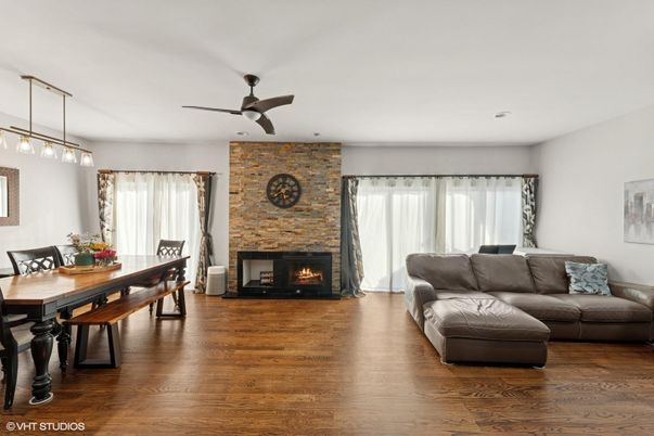 Dining room, Fireplace, Interior, Living room, Pendant Lights, Stone Walls, Wood Texture Flooring