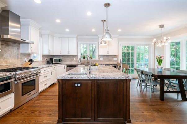 Dining room, Interior, Kitchen, Pendant Lights, Recessed Lighting, Stainless Steel Appliances, Wood Texture Flooring