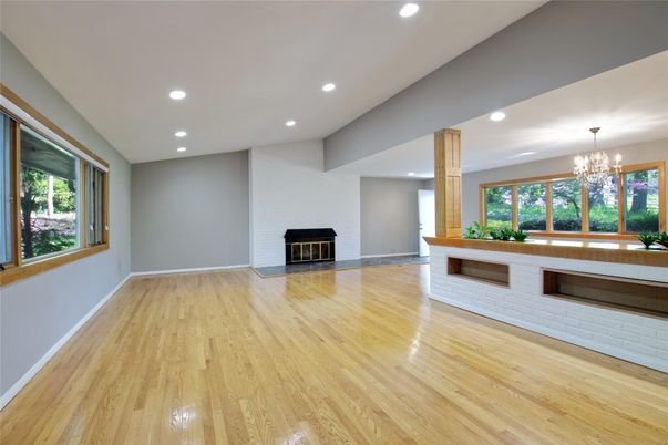 Chandelier, Empty room, Fireplace, Interior, Recessed Lighting, Wood Texture Flooring