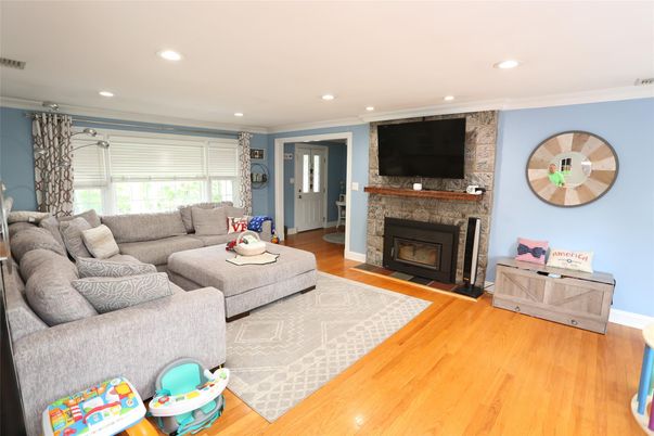 Fireplace, Interior, Living room, Recessed Lighting, Wood Texture Flooring
