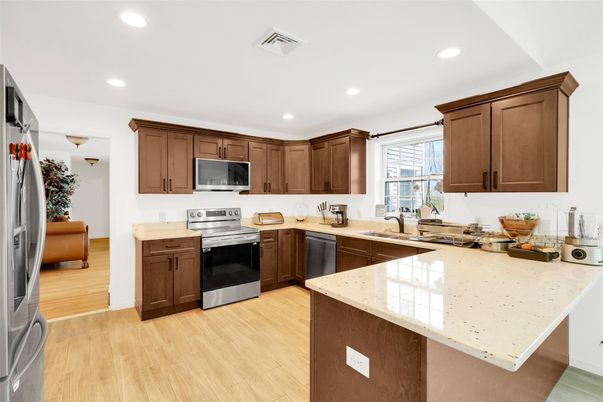 Interior, Kitchen, Recessed Lighting, Stainless Steel Appliances, Wood Texture Flooring