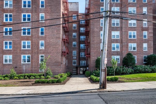 Exterior, Facade, Brick Facade, Condo Building