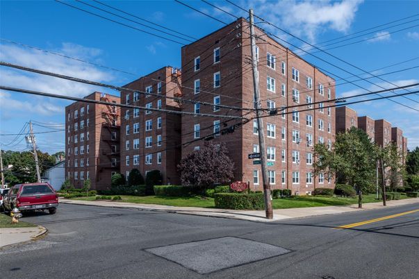 Exterior, Facade, Brick Facade, Condo Building