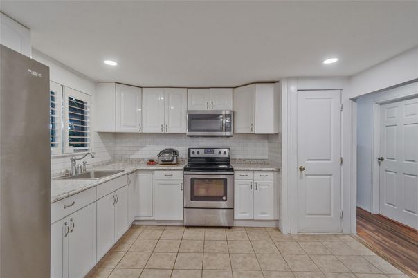 Interior, Kitchen, Recessed Lighting, Stainless Steel Appliances, Wood Texture Flooring