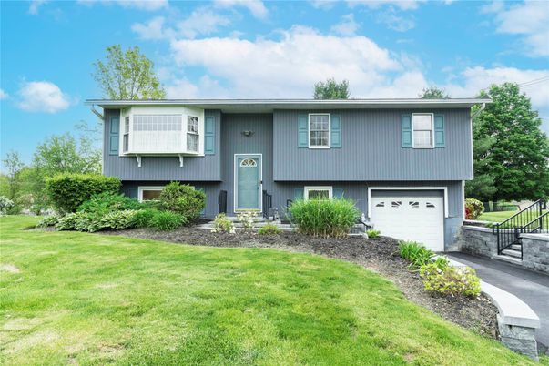 Attached, Exterior, Facade, Raised Ranch