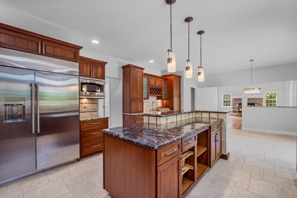 Fireplace, Interior, Kitchen, Pendant Lights, Recessed Lighting, Stainless Steel Appliances