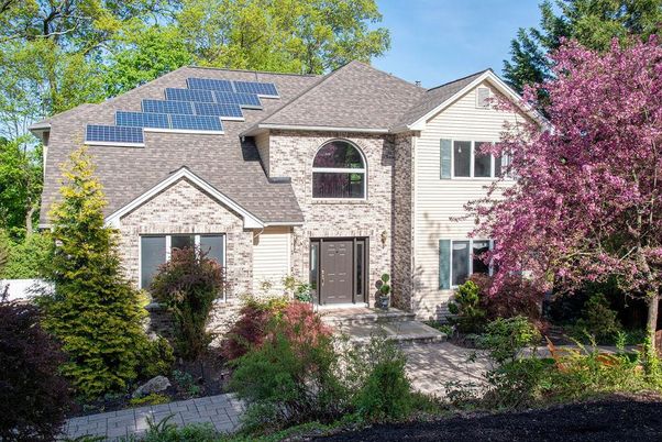 Exterior, Facade, Solar Panels, Brick Traditional