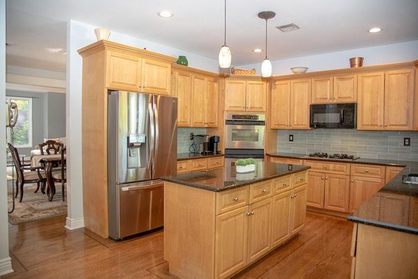 Dining room, Interior, Kitchen, Pendant Lights, Recessed Lighting, Stainless Steel Appliances, Wood Texture Flooring