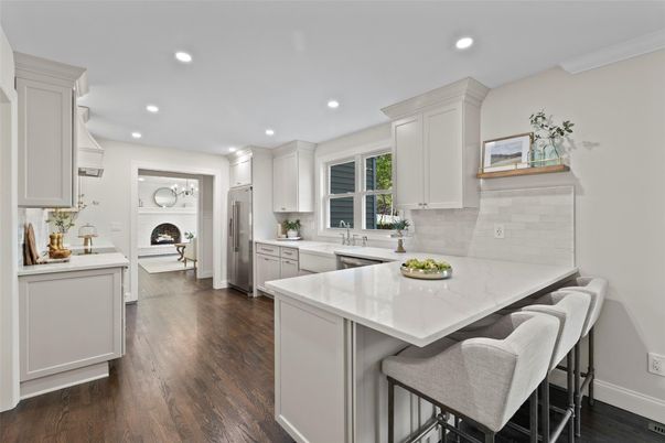 Fireplace, Interior, Kitchen, Recessed Lighting, Stainless Steel Appliances, Wood Texture Flooring