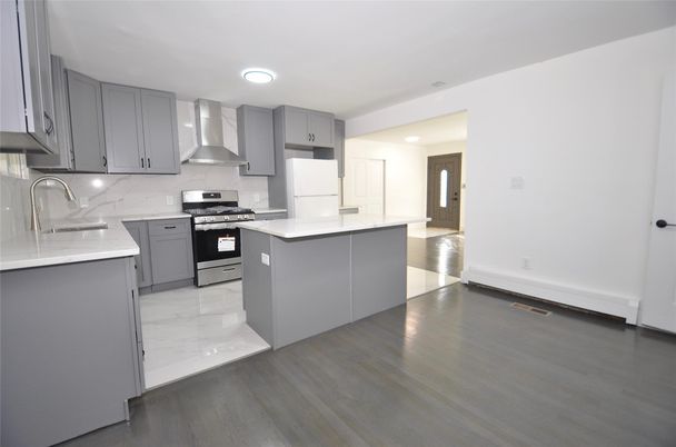 Interior, Kitchen, Marble, Recessed Lighting, Stainless Steel Appliances, Wood Texture Flooring