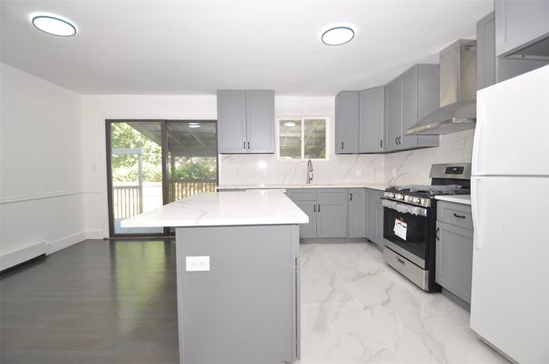 Interior, Kitchen, Marble, Marble Walls, Recessed Lighting, Stainless Steel Appliances