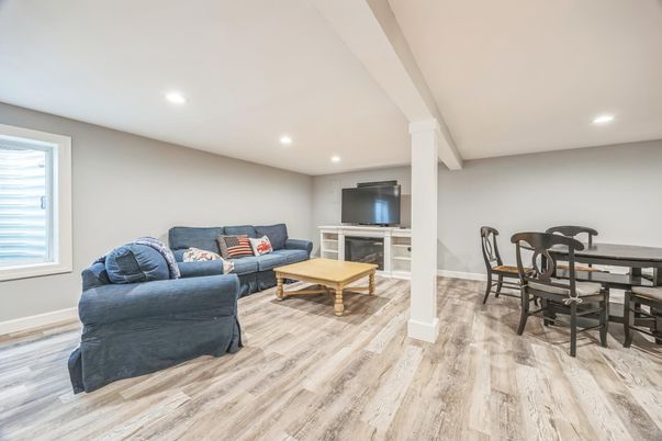 Dining room, Fireplace, Interior, Living room, Recessed Lighting, Wood Texture Flooring