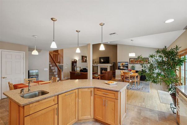Dining room, Fireplace, Interior, Living room, Pendant Lights, Recessed Lighting, Wood Texture Flooring