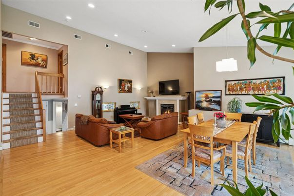 Dining room, Fireplace, Interior, Living room, Pendant Lights, Recessed Lighting, Wood Texture Flooring
