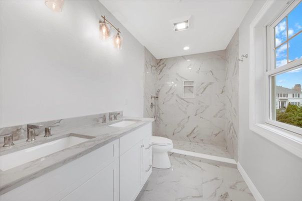 Bathroom, Dual Sink Vanities, Interior, Marble, Marble Walls, Recessed Lighting