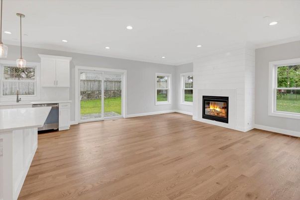 Empty room, Fireplace, Interior, Kitchen, Pendant Lights, Recessed Lighting, Wood Texture Flooring