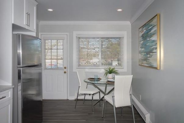 Dining room, Interior, Kitchen, Recessed Lighting, Stainless Steel Appliances, Wood Texture Flooring