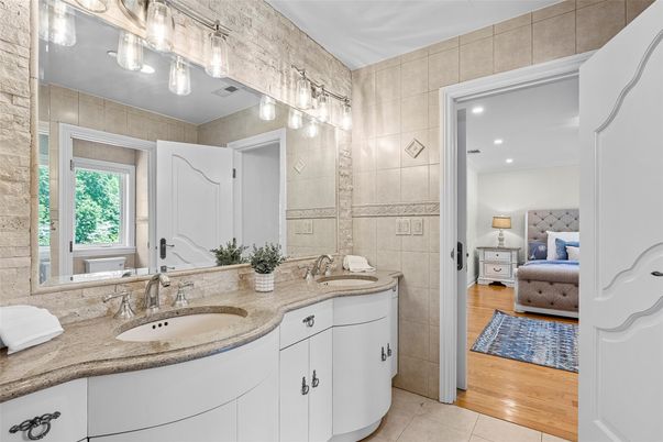 Bathroom, Dual Sink Vanities, Interior, Recessed Lighting, Wood Texture Flooring