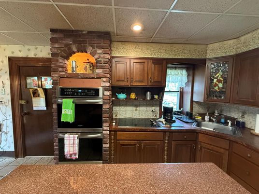 Interior, Kitchen, Recessed Lighting, Stainless Steel Appliances, Stone Walls