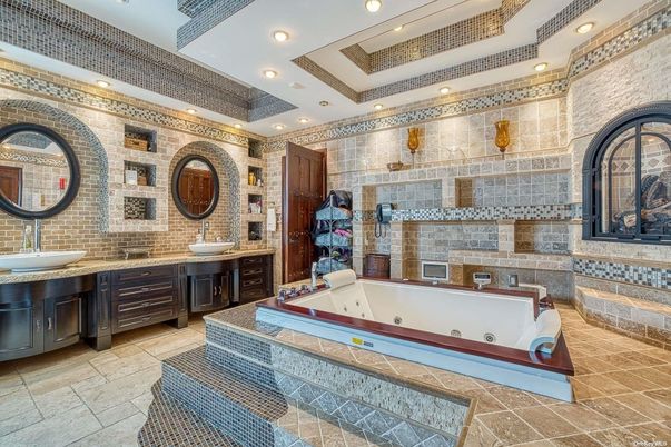 Bathroom, Dual Sink Vanities, Interior, Recessed Lighting, Stone Walls
