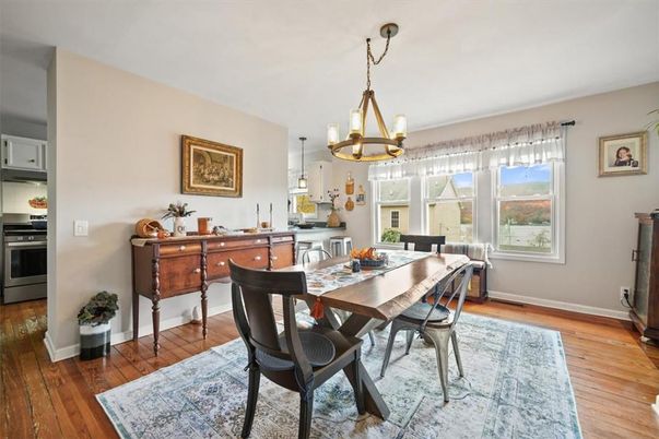 Chandelier, Dining room, Interior, Kitchen, Pendant Lights, Stainless Steel Appliances, Wood Texture Flooring