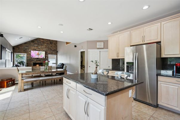 Dining room, Fireplace, Interior, Kitchen, Recessed Lighting, Stainless Steel Appliances, Stone Walls